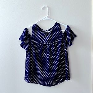 Navy cold-shoulder short sleeve shirt with white polka dots.